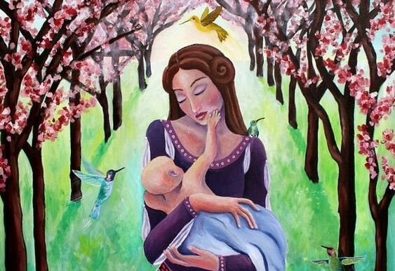 annesinin yüzüne dokunan bebek