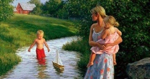 Anne çocukları ile nehirde